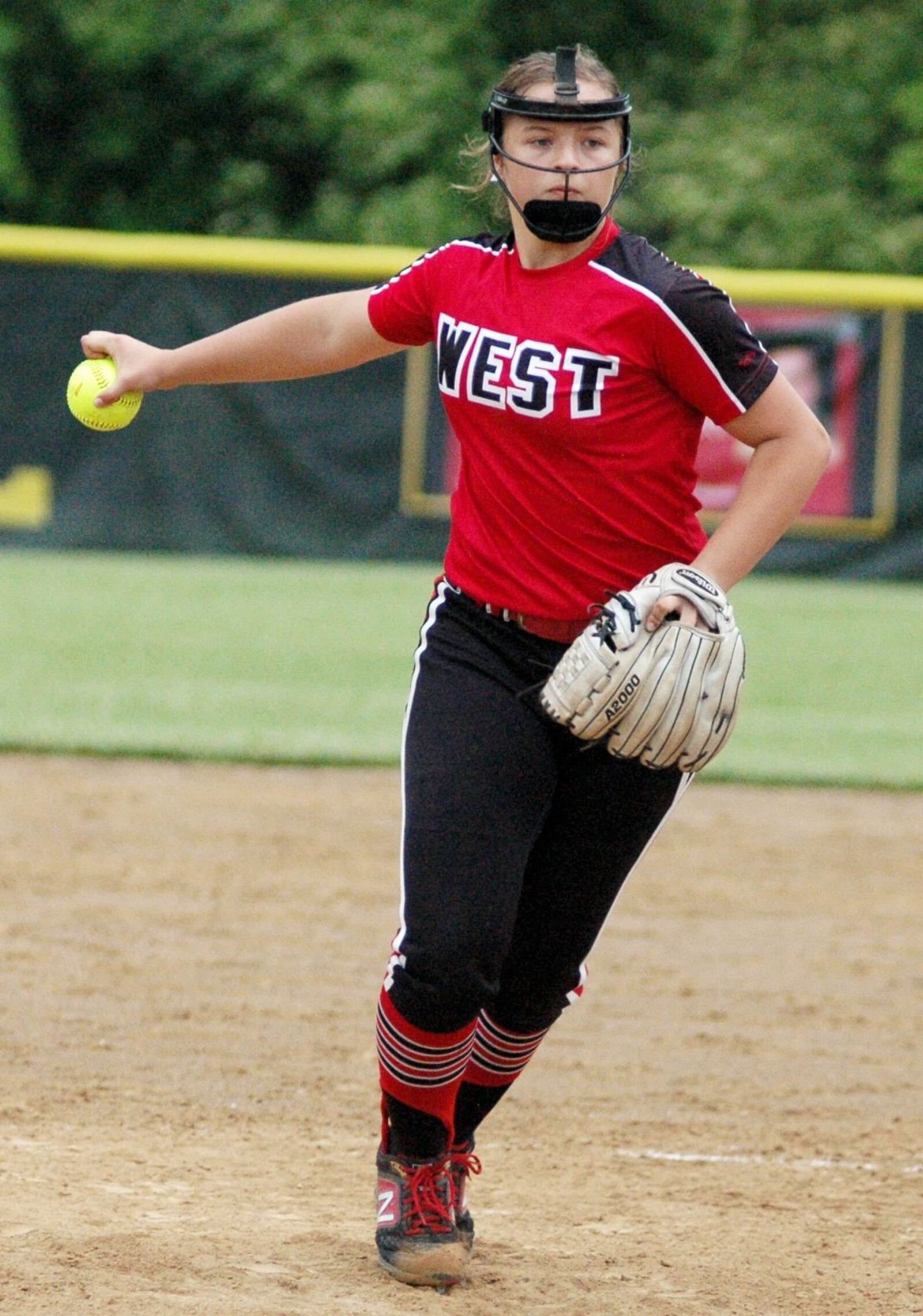 Lakota West pitcher K.K. Mathis prepares to send a pitch toward the plate Wednesday during a 2-0 victory over Harrison in a Division I regional softball semifinal at Centerville. RICK CASSANO/STAFF