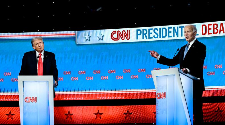 FILE — President Joe Biden, right, during his debate with former President Donald Trump, left, in Atlanta on June 27, 2024. A post-debate poll by The New York Times and Siena College found that 74 percent of voters said Biden is too old for the job and that 42 percent say Trump is. (Kenny Holston/The New York Times)