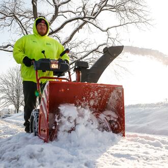 Ethan Lenos uses a snowblower to clear the sidewalks along W. State Street Tuesday, Dec. 2, 2025 in Trenton. NICK GRAHAM/STAFF