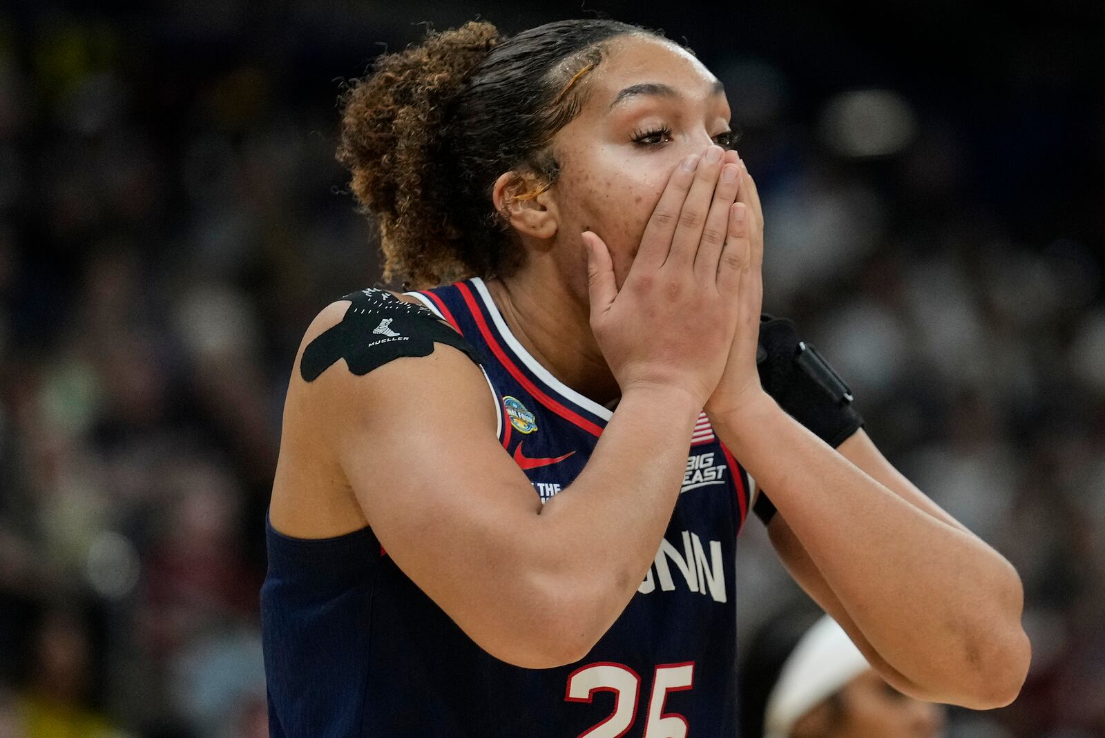 UConn forward Ice Brady (25) reacts during the first half of the national championship game against South Carolina at the Final Four of the women's NCAA college basketball tournament, Sunday, April 6, 2025, in Tampa, Fla. (AP Photo/Chris O'Meara)