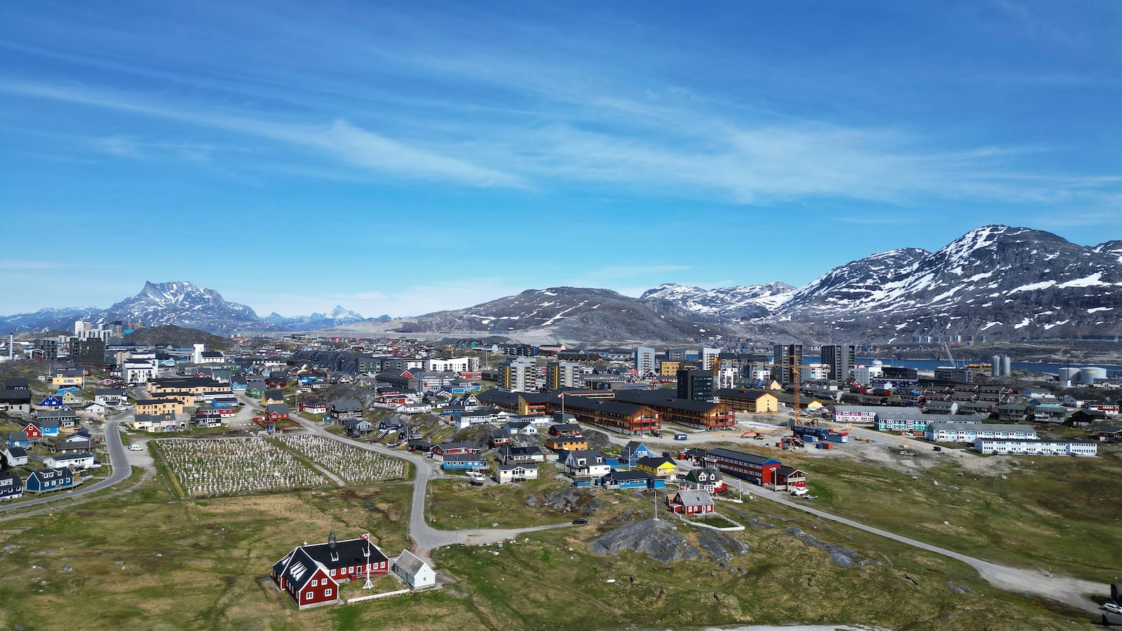 Houses in Nuuk, Greenland, Sunday, June 22, 2025. (AP Photo/Kwiyeon Ha)