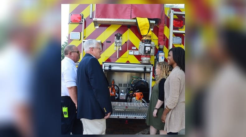 Looking at features in the new pumper truck of the Oxford Fire Department are (from left) Fire Chief John Detherage, City Manager Doug Elliott, Clerk of Council Heather Barbour and City Council member Amber Franklin. The truck was taken to the July 5 Council meeting and shown to councilors prior to the meeting. CONTRIBUTED/BOB RATTERMAN