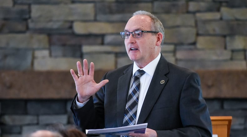 Monroe Local Schools superintendent Phil Cagwin speaks in April during the K-12 Education Summit hosted by the Chamber of Commerce serving Middletown, Monroe and Trenton. Cagwin has told the Journal-News the current school year will be his last. Cagwin, who was also superintendent of Talawanda Schools for a decade before joining Monroe Schools in 2012, blasted state and federal education officials for micromanaging local schools in Ohio. NICK GRAHAM/STAFF