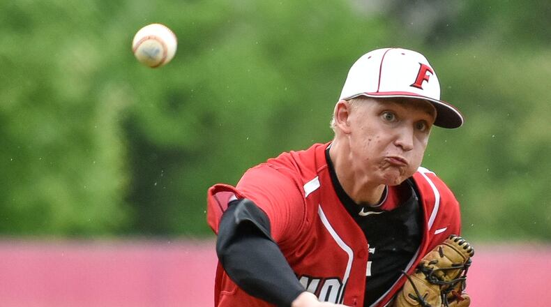 Kurt Lange, shown throwing a pitch against Elder in a Division I sectional game against visiting Elder on May 12, 2016, will be the Indians’ starting pitcher Thursday in a regional semifinal against St. Xavier at the University of Cincinnati’s Marge Schott Stadium. NICK GRAHAM/STAFF