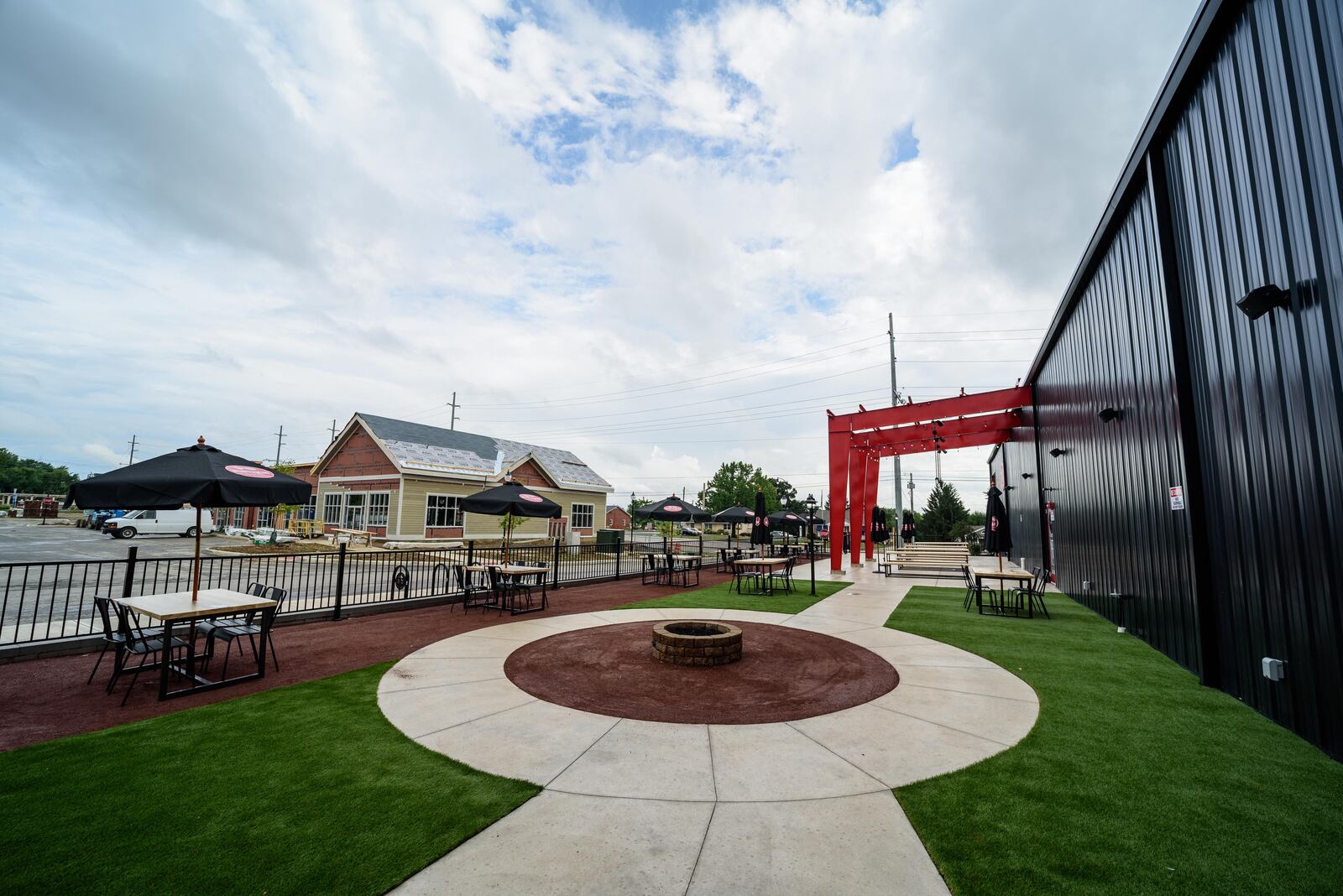 Here's a look at the soft opening of the Warped Wing Barrel Room & Smokery in Springboro on Friday, August 28, 2020. Located on the corner 73 and 741 in the new mixed-use Wright Station development by Synergy & Mills Development, this is Warped Wing Brewing Company's second location. TOM GILLIAM/CONTRIBUTING PHOTOGRAPHER