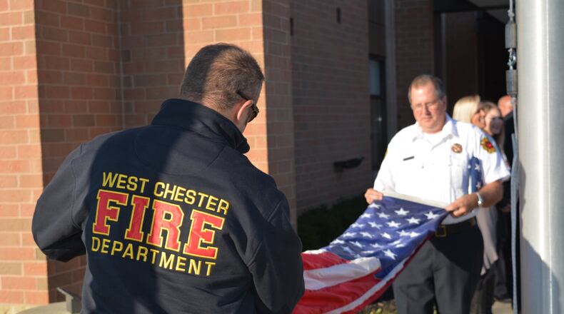 A flag flown by West Chester Twp. late last year could be visible on the podium with U.S. athletes this month during the Winter Olympics in Pyeongchang, South Korea. The flag, part of the Team USA Bobsled and Skeleton American Flag First Responders Relay, flew at West Chester Fire Headquarters Oct. 26, where the honor guard was present for a brief ceremony. It also flew briefly at the West Chester Police Department. CONTRIBUTED