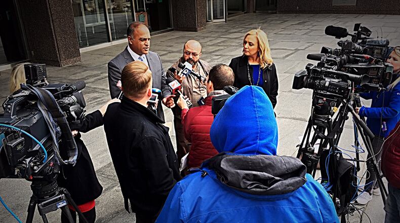 First Assistant U.S. Attorney Vipal Patel, center, speaks to the media after a plea agreement hearing in which Ethan Kollie, a Kettering man who had been a friend to Oregon District shooter Connor Betters, pleaded guilty Wednesday to firearms charges. MARSHALL GORBY/STAFF