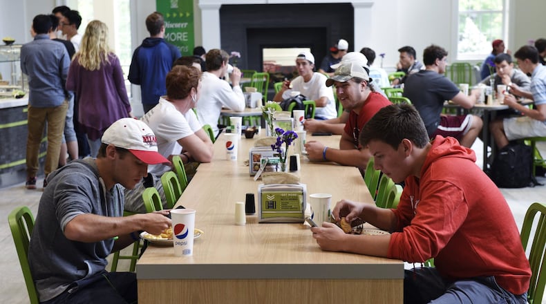 FILE PHOTO: Miami University students eat in the new Garden Commons dining hall on campus. NICK GRAHAM/STAFF