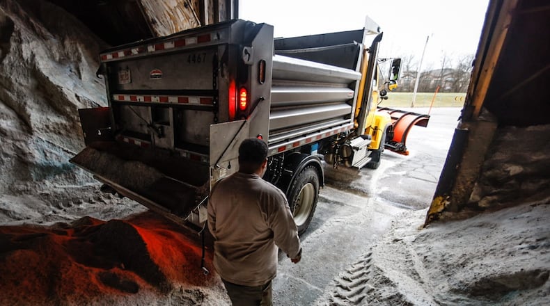 The I75 contraflow lane is closing at noon Saturday as road crews around the region prepare to handle up to a foot of snow forecast to fall over the weekend. Jim Noelker / Staff