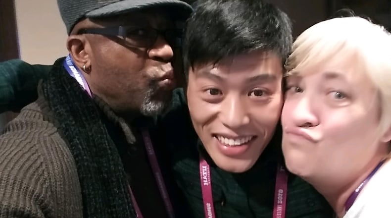 Robert "Bobby" Allen, Wong He and Jill Lamantia pose for a selfie. The trio appears in Julia Reichert and Steven Bognar's "American Factory" and are featured on a poster for it.