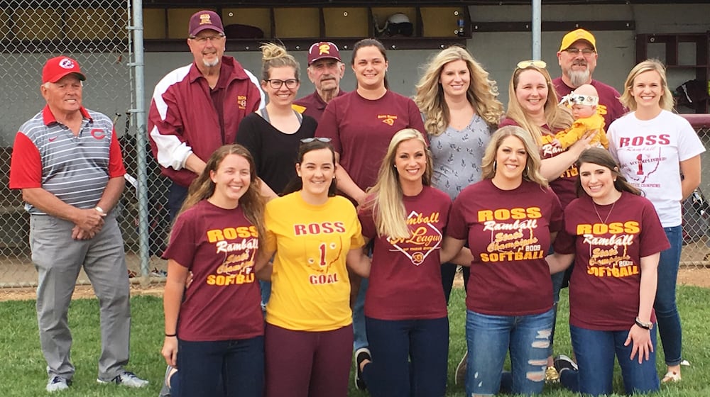 Members of Ross High School’s 2009 Division II state championship softball team pose for a photo before Wednesday’s game against visiting Northwest. STAFF