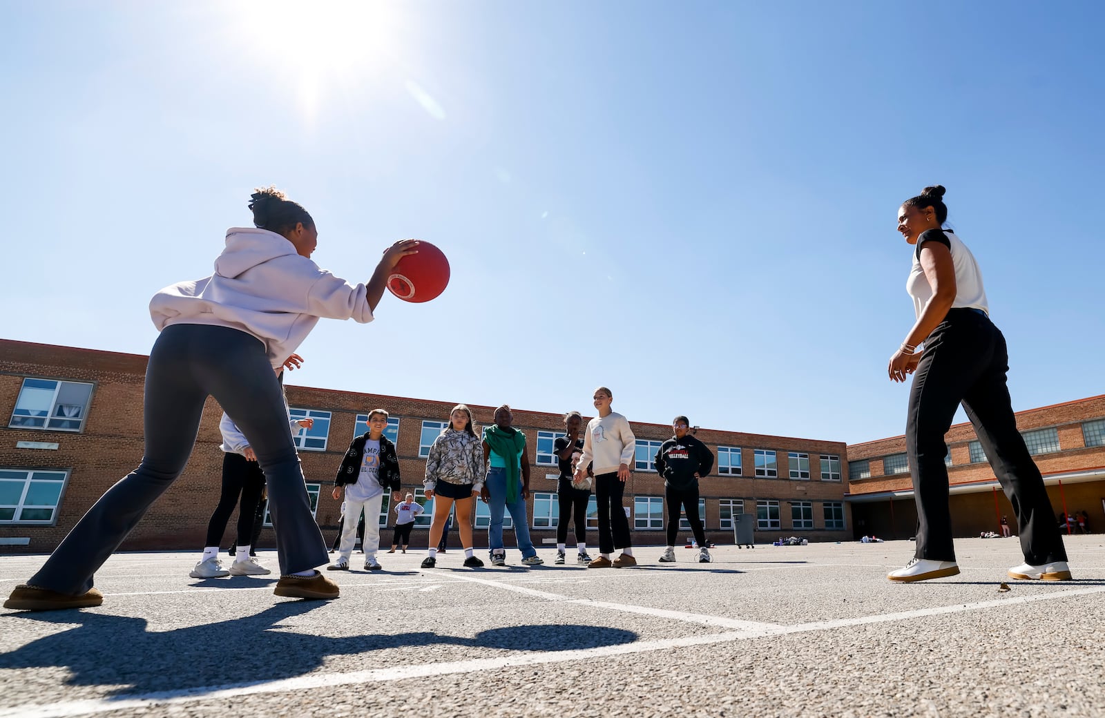 Principal Denise Hayes interacts with students during recess at Fairfield North Elementary Tuesday, Oct. 14 in Fairfield Township. Fairfield North Elementary has earned a 5-star ranking on the Ohio state report card. NICK GRAHAM/STAFF