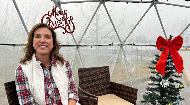 Avinne Kiser, founder of Middletown Holiday Whopla, recently was honored for her philanthropic achievements. She received the Middletown Community Foundation “Volunteer of the Year” Award and the West Chester Liberty Alliance “Women of Excellence” Award. She discussed those awards while sitting in a heated igloo near the downtown ice skating rink. RICK McCRABB/CONTRIBUTOR