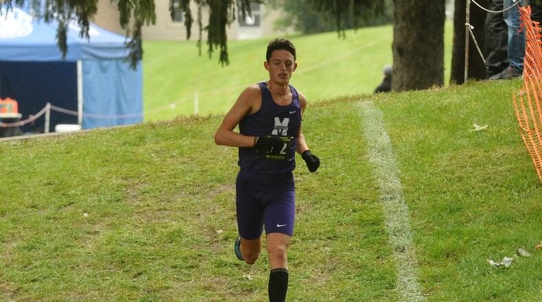 Middletown senior Conant Smith, pictured here during the regional meet, won the Division I state championship. Contributed/ Greg Billing