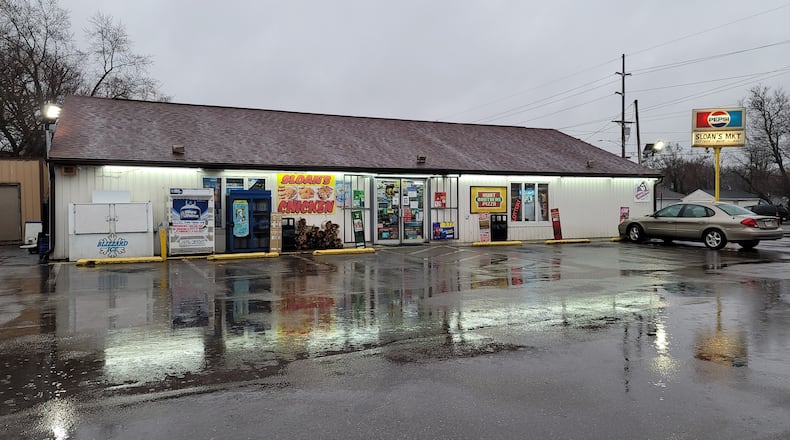 The owners of Sloan's Market, 1825 Highland St., want to add a drive-through and parking spaces. The city's planning commission denied the zoning change and city council is expected to vote on the ordinance at its next meeting. NICK GRAHAM/STAFF