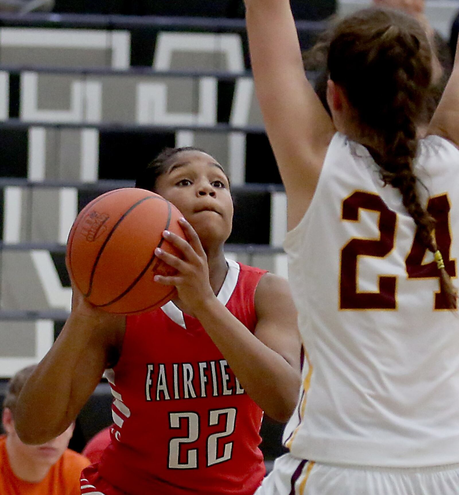 Fairfield guard Journee Hicks is covered by Turpin forward Elise Schulok during Thursday night’s Division I sectional semifinal at Lakota East. CONTRIBUTED PHOTO BY E.L. HUBBARD