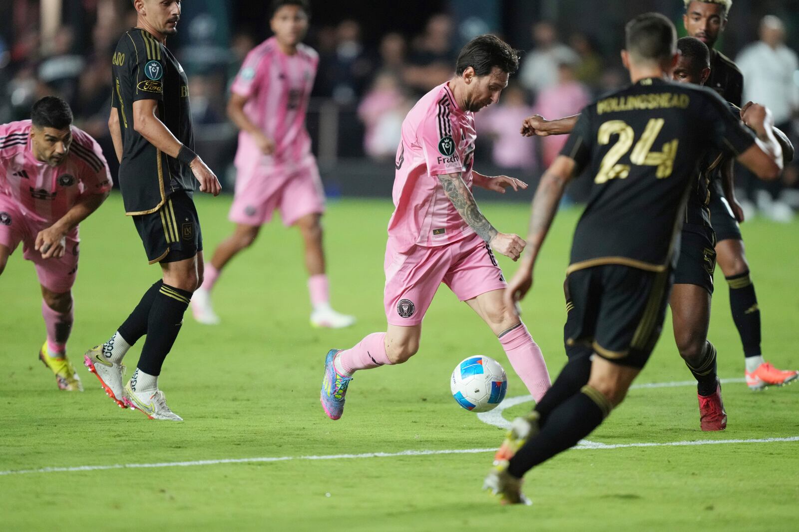 Inter Miami forward Lionel Messi (10) brings the ball up the field against the Los Angeles FC during the second half of a CONCACAF Nations League Quarterfinal Match at Chase Stadium, Wednesday, April 9, 2025 in Fort Lauderdale, Fla. (AP Photo/Jim Rassol)