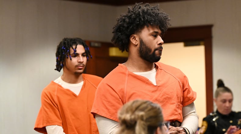 Pictured are Lemond Chambers, 20, of Middletown, (foreground) and Keatrick Thomas, 19, of Middletown. They are charged with multiple felonies, including aggravated burglary and abduction. They are accused of an alleged home invasion where both men are said to have held a grandmother and her 12-year-old grandson at gunpoint. Both will be back in court at 9 a.m. on April 10, 2025. MICHAEL D. PITMAN/STAFF