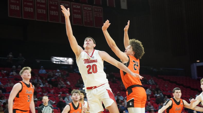 Miami’s Tyler Robbins goes up for a shot against Milligan on Monday afternoon at Millett Hall. CHRIS VOGT / CONTRIBUTED
