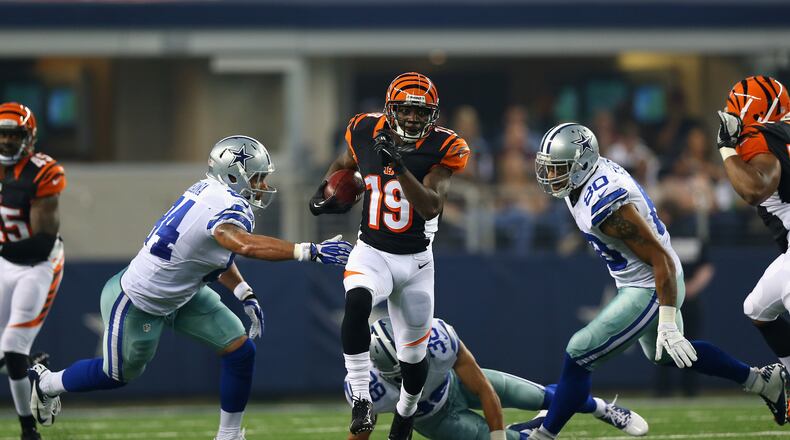 ARLINGTON, TX - AUGUST 24: Brandon Tate #19 of the Cincinnati Bengals returns a punt for a touchdown against the Dallas Cowboys during a preseason game at AT&T Stadium on August 24, 2013 in Arlington, Texas. (Photo by Ronald Martinez/Getty Images)