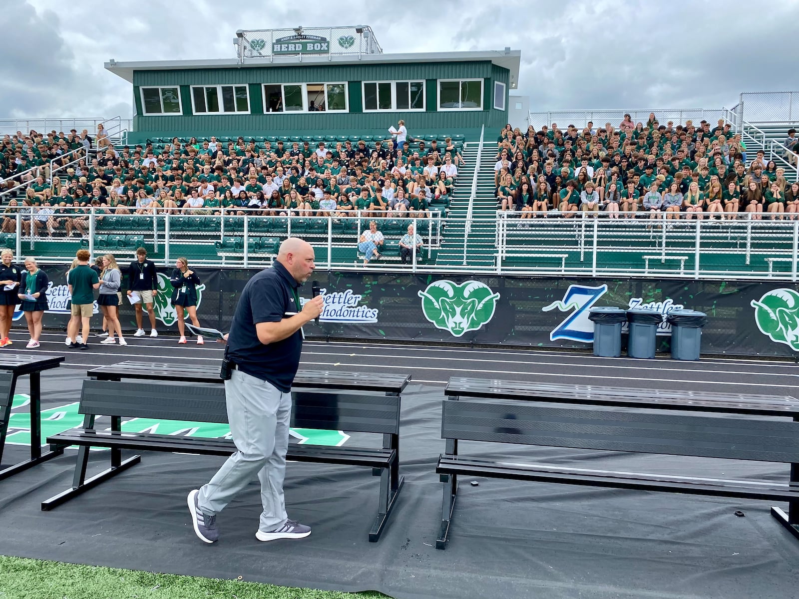Badin High School’s held its first official tour and pep rally Friday in its new $15 million stadium, the first on-campus athletic facility in the school’s 60-year history. Brian Pendergest, president of Badin High School, helped to rally the students. (Photo By Michael D. Clark/Journal-News)