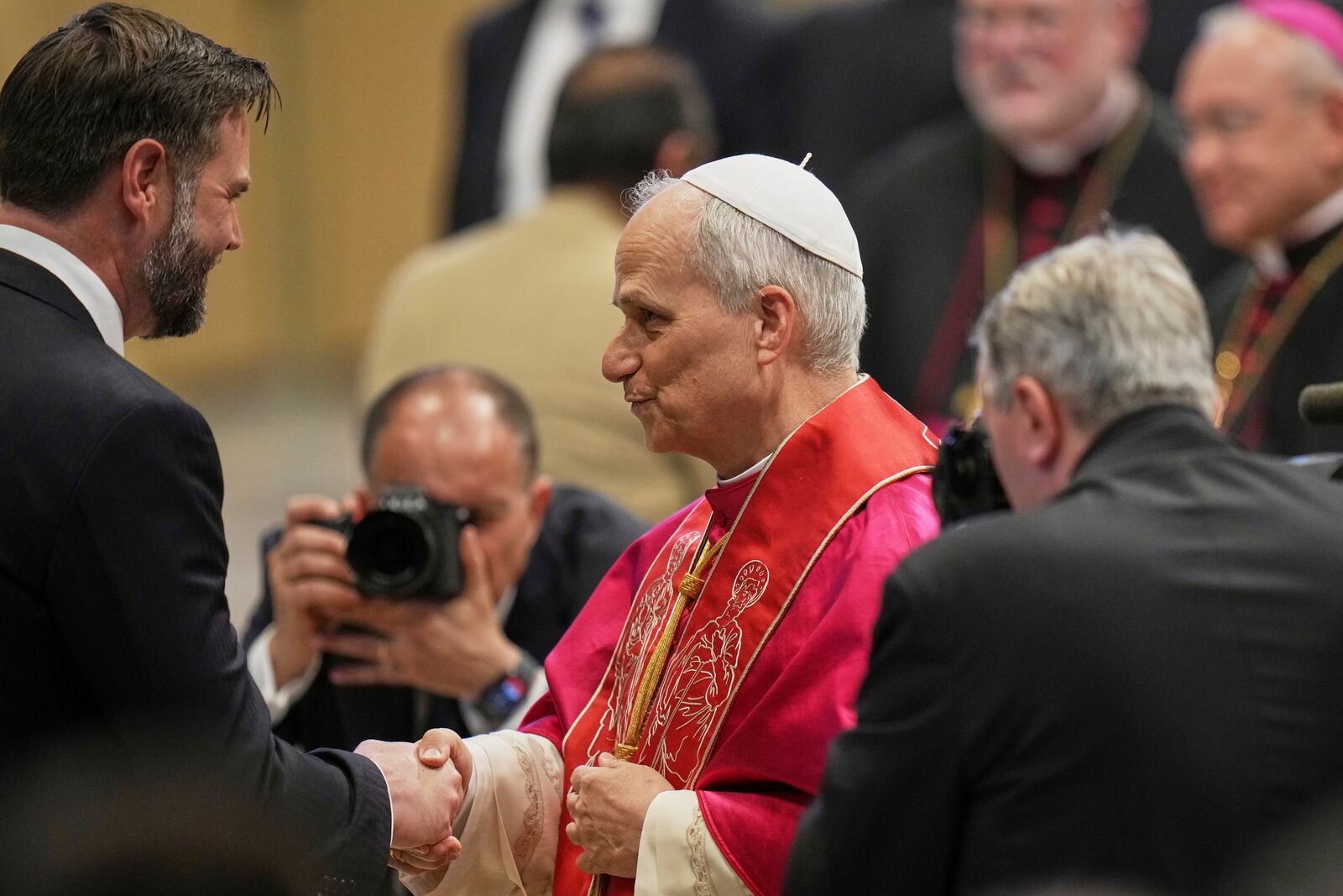 Pope Leo XIV's meets Vice President JD Vance after the formal inauguration of his pontificate in St. Peter's Square, at the Vatoican, Sunday, May 18, 2025. (AP Photo/Alessandra Tarantino)