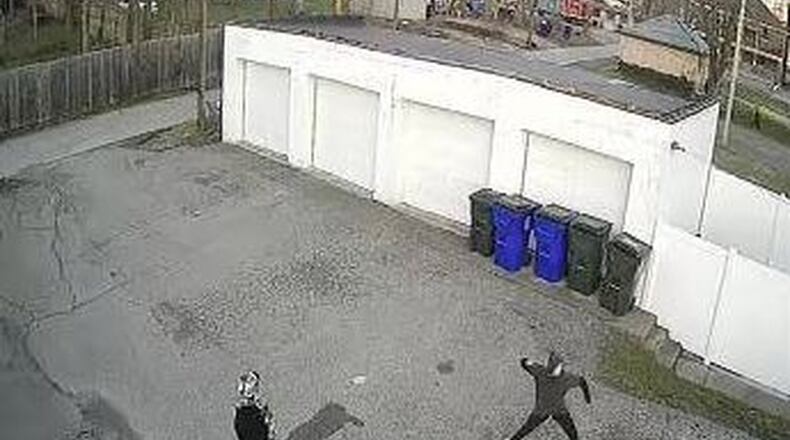 Hamilton police are investigating vandalism incidents at a local apartment complex on High Street. Security video caught two males throwing rocks through the window of a car.