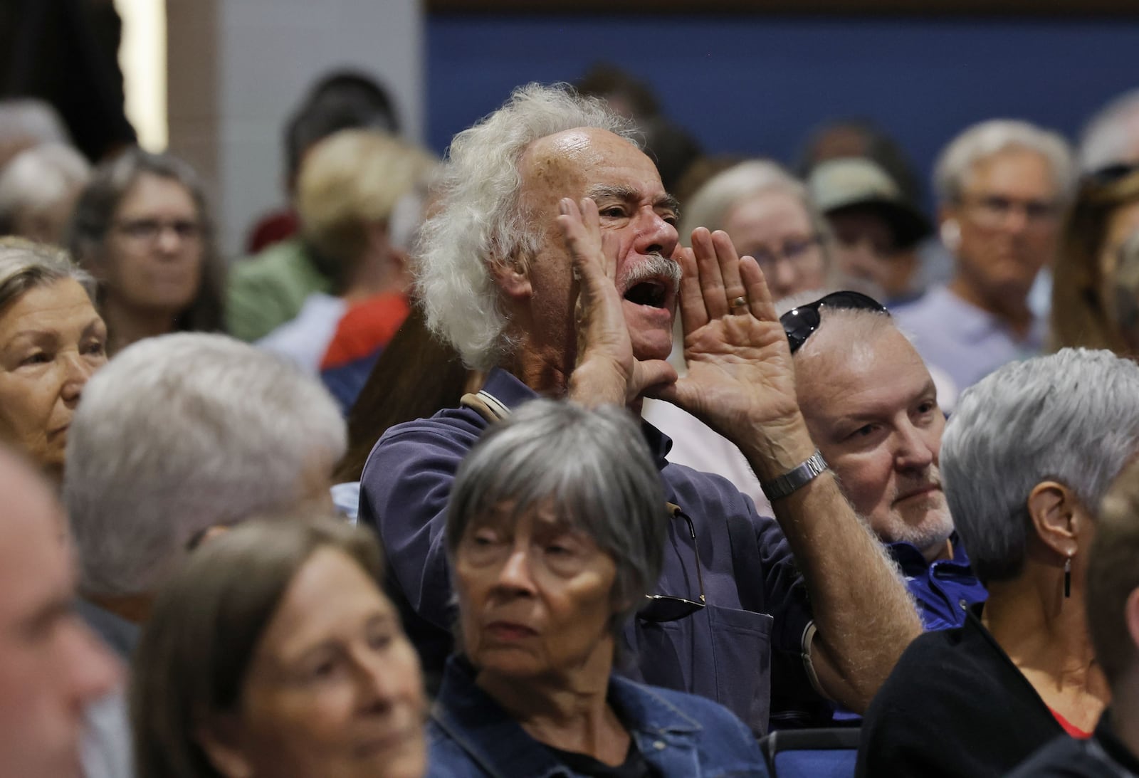 Congressman Warren Davidson spoke and answered questions during a congressional town hall event at a packed auditorium at Edgewood Middle School Wednesday, Aug. 27, 2025. NICK GRAHAM/STAFF