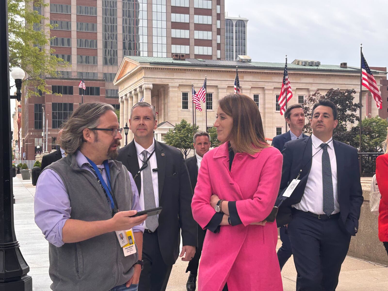 Roberta Metsola, president of the European Parliament interviewed by a Dayton Daily News reporter as she walked down Main Street between events.