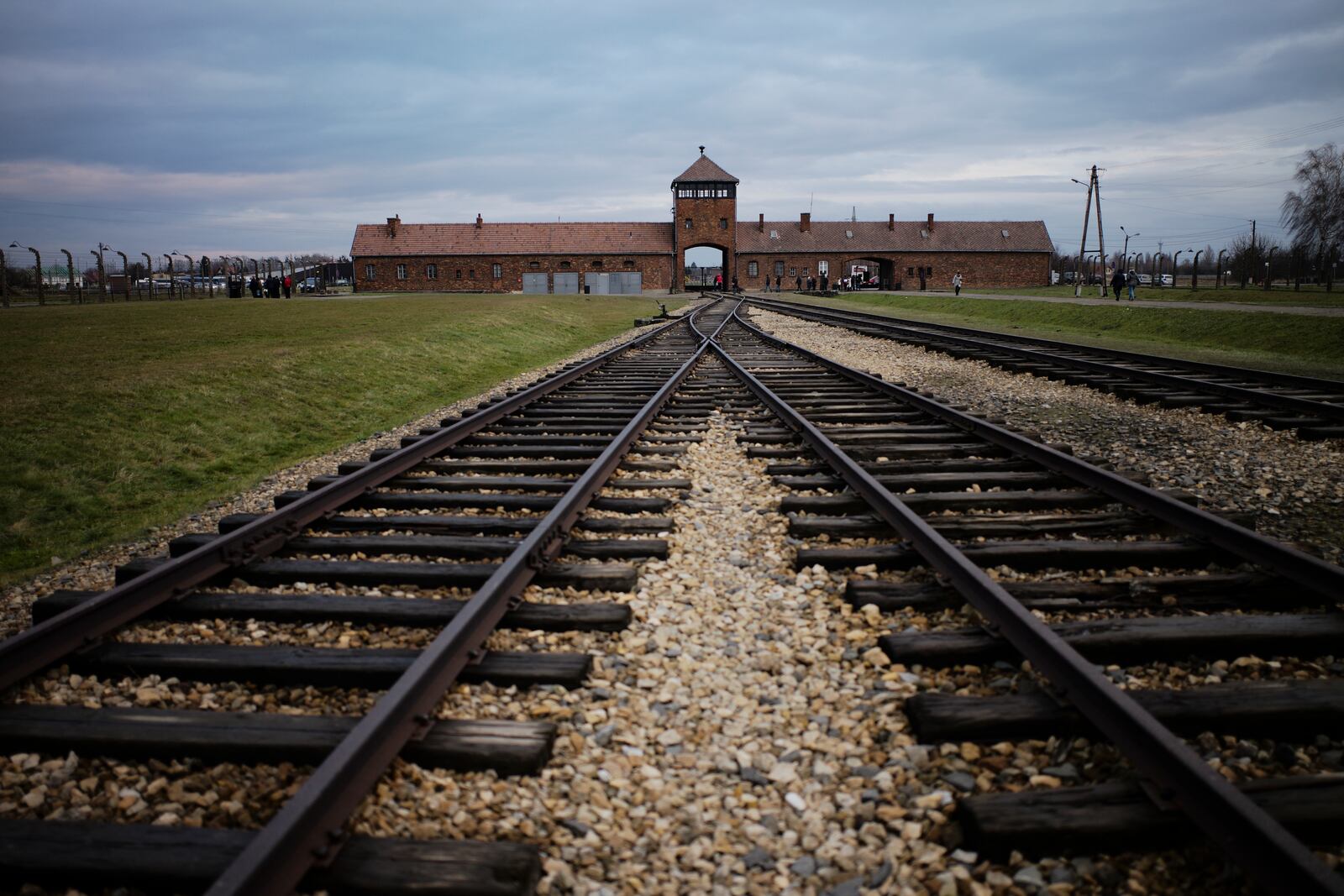 FILE - The railway tracks where hundred thousands of people arrived to be directed to the gas chambers inside the former Nazi death camp of Auschwitz Birkenau, or Auschwitz II, are pictured in Oswiecim, Poland, on Dec. 7, 2019. (AP Photo/Markus Schreiber, file)