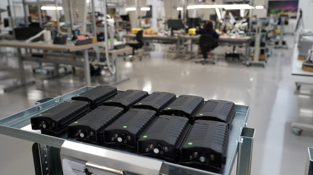 Assembled counter drone devices sit on a try at MyDefence's headquarters in Alborg, Denmark, on Oct. 28, 2025. (AP Photo/James Brooks)