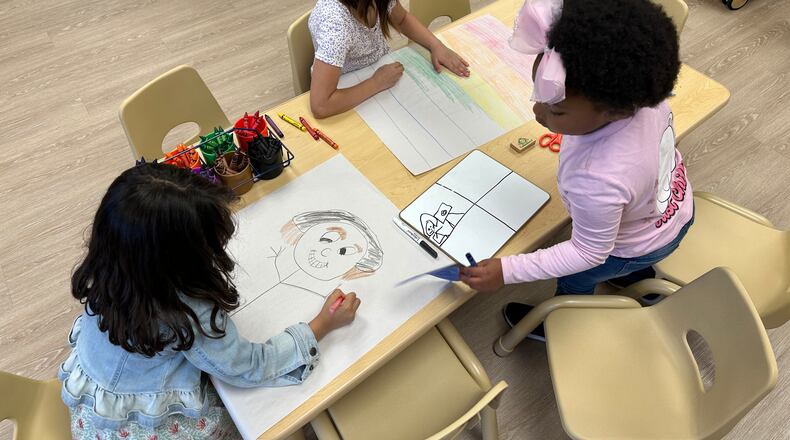 FILE - Children draw in one of the classrooms at the Children's Promise Centers child care center in Albuquerque, N.M., April 5, 2024. (AP Photo/Susan Montoya Bryan, File)