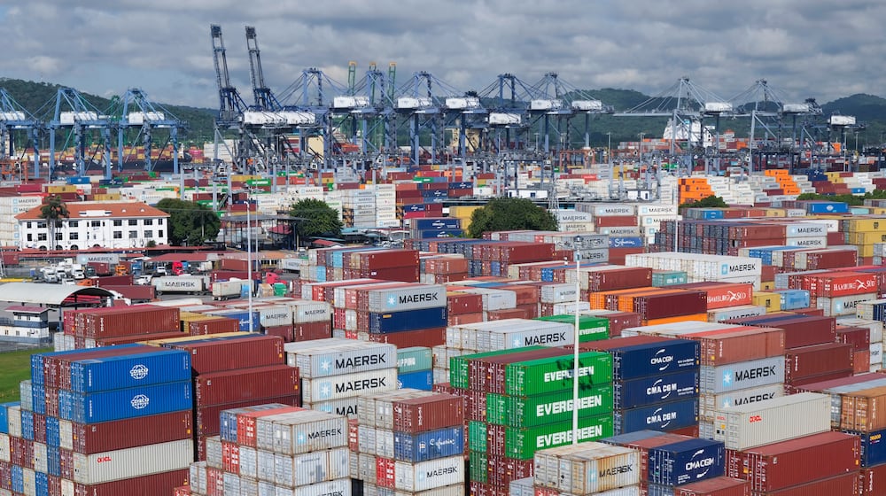 FILE - Ship containers are stacked at the Panama Canal Balboa port, operated by the Panama Ports Company, in Panama City, Sept. 20, 2025. (AP Photo/Matias Delacroix, File)
