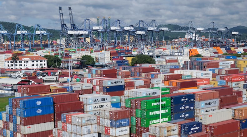 FILE - Ship containers are stacked at the Panama Canal Balboa port, operated by the Panama Ports Company, in Panama City, Sept. 20, 2025. (AP Photo/Matias Delacroix, File)