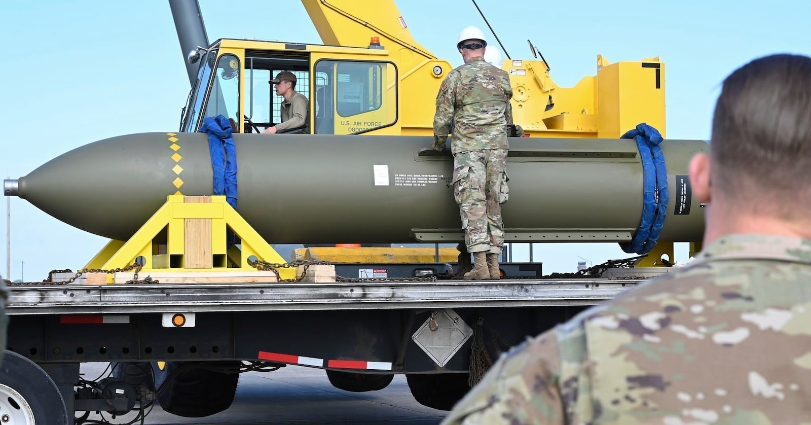 FILE - In this photo released by the U.S. Air Force on May 2, 2023, airmen look at a GBU-57, or the Massive Ordnance Penetrator bomb, at Whiteman Air Base in Missouri.(U.S. Air Force via AP, File)
