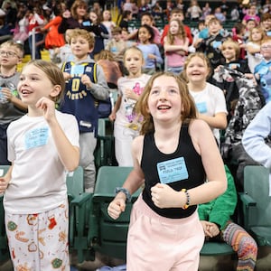 Students from Indian Riffle Elementary School in Kettering dance during Wright State's womens basketball team's Education Day game against Bellarmine on Wednesday, Nov. 19 at the Nutter Center in Fairborn. Over 30 schools attended the game. The Raiders lost 83-76 in overtime. BRYANT BILLING/STAFF