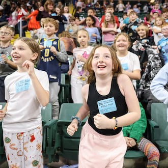 Students from Indian Riffle Elementary School in Kettering dance during Wright State's womens basketball team's Education Day game against Bellarmine on Wednesday, Nov. 19 at the Nutter Center in Fairborn. Over 30 schools attended the game. The Raiders lost 83-76 in overtime. BRYANT BILLING/STAFF