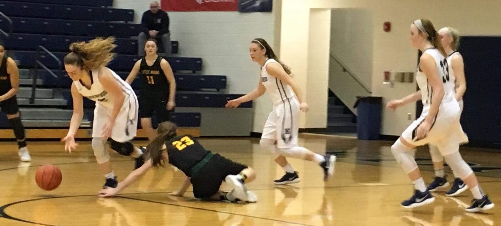 Edgewood’s Zoe Stephen (2) gets the ball away from Little Miami’s Kaitlyn Simpkins (23) and starts to head down the floor during Saturday afternoon’s game at Ron Kash Court in St. Clair Township. RICK CASSANO/STAFF