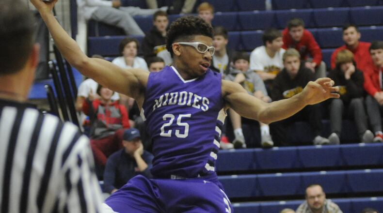 Middletown’s Jawunn Bailey chases down a loose ball during Monday night’s game against Alter in the Premier Health Flyin’ to the Hoop at Fairmont’s Trent Arena. MARC PENDLETON/STAFF