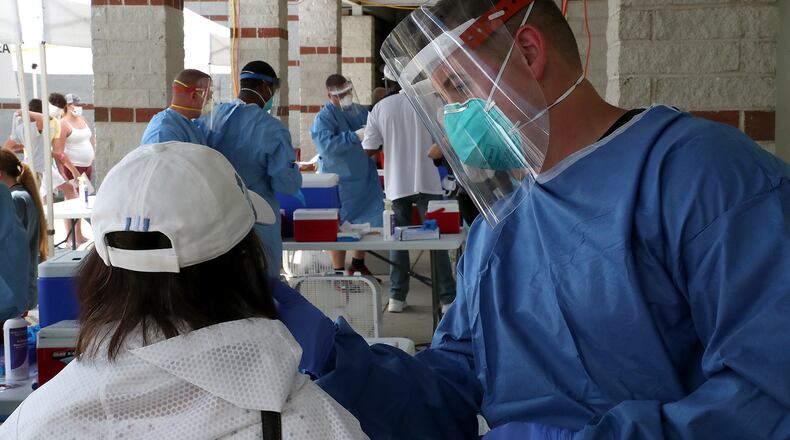 The Clark County Combined Health District held a free COVID-19 testing clinic Wednesday at Perrin Woods Elementary. BILL LACKEY/STAFF