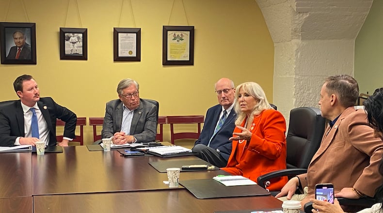 Hamilton city, community and business leaders went to Columbus on Nov. 20, 2024, to continue its lobbying efforts for one or possibly two Amtrak passenger rail stops. They met with several Ohio representatives and senators from Southwest Ohio. Pictured, from left, are Ohio Rep. Thomas Hall, Hamilton Councilmember Tim Naab, Hamilton Mayor Pat Moeller, and Ohio Rep. Sara Carruthers. TVHAMILTON/PROVIDED