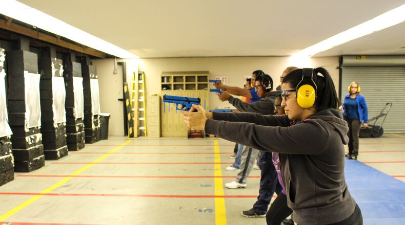 Participants in Hamilton Police Department’s Hispanic Police Academy learn about firearms safety. The Middletown Police Department is planning to restart its Citizen Police Academy in 2018. CONTRIBUTED