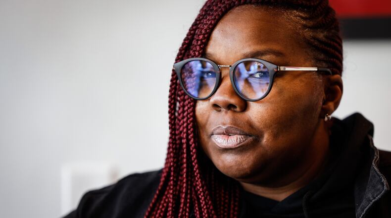 Davia Allen, owner of Vidia's Closet in downtown Dayton, is hosting a Sex and the City Fashion Show. Jim Noelker/Staff