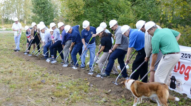 The city of Fairfield broke ground Saturday morning, Oct. 6, 2018, on its new dog park on River Road, just south of Marsh Park, on a 6.5-acre parcel. MICHAEL D. PITMAN/STAFF