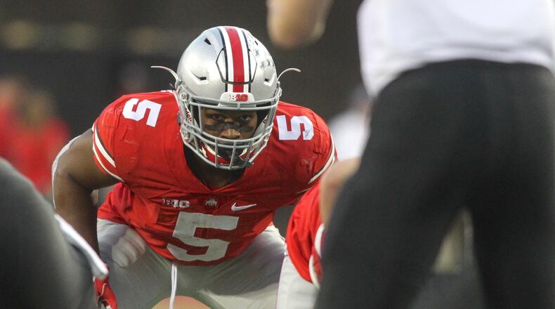 Ohio State’s Raekwon McMillan prepares for a play against Northwestern on Saturday, Oct. 29, 2016, at Ohio Stadium in Columbus. David Jablonski/Staff