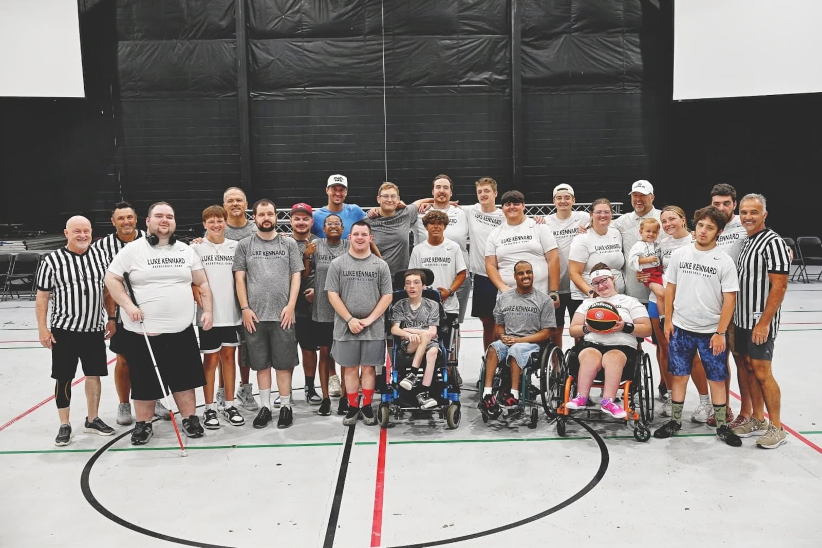 Those who participated in the second annual "One Special Game," a basketball game for players with special needs, pose for a picture after the game. SUBMITTED PHOTO