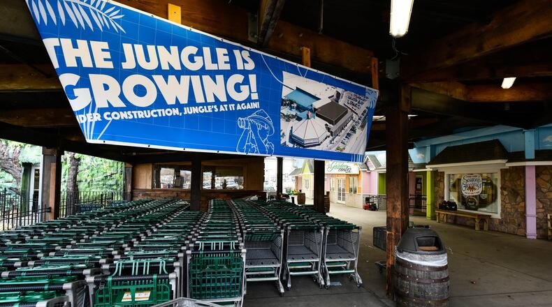 Jungle Jim’s International Market is growing yet again. Crews started adding fencing and installed banners outside the Fairfield store Monday, Jan. 13 to tout its front end expansion project, which is slated to add 17,000 square feet and new tenants, according to store officials. One of the new tenants will be Graeter’s Ice Cream, which will have a drive-thru, according to Phill Adams, the store’s director of development. Another new tenant will be named at a later date. NICK GRAHAM / STAFF