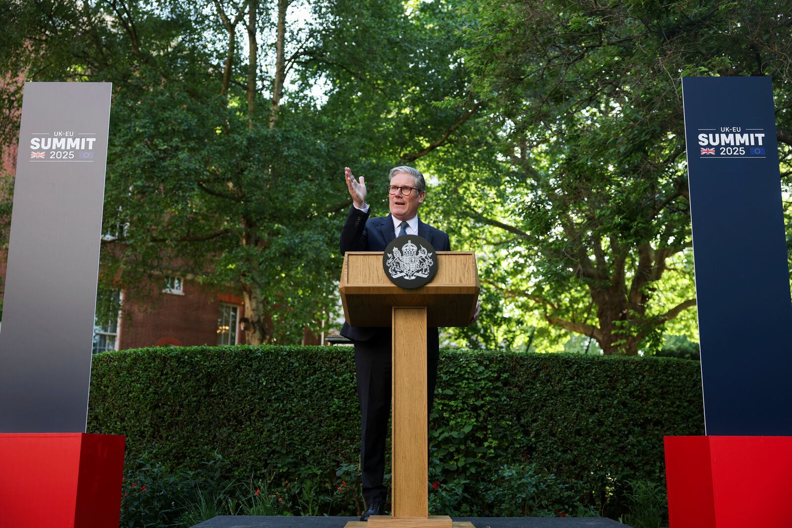 Britain's Prime Minister Keir Starmer speaks during a reception following the UK-EU summit, in London, Monday May 19, 2025. (Hannah McKay/Pool via AP)