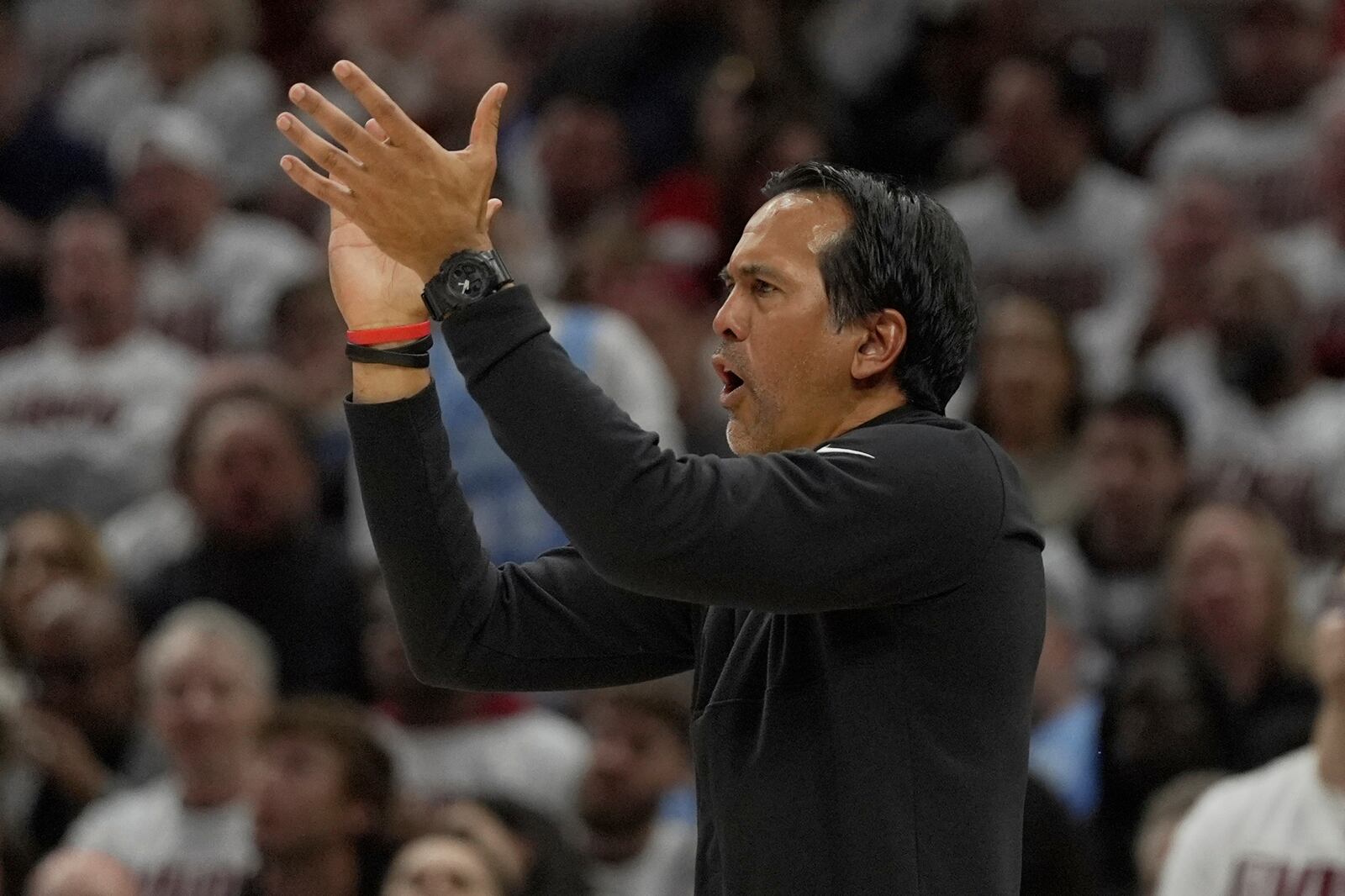 Miami Heat head coach Erik Spoelstra gestures in the second half in Game 1 of an NBA first-round playoff series against the Cleveland Cavaliers, Sunday, April 20, 2025, in Cleveland. (AP Photo/Sue Ogrocki)