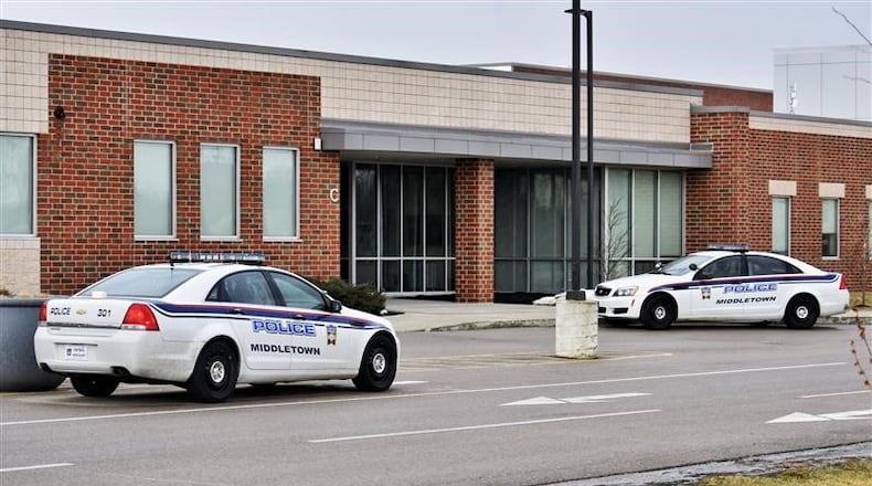 Middletown Police raced to Middletown High School this afternoon as classes were being dismissed. Police were responding to a threat of violence against the school. There were no injuries or suspect found on campus as police continue their investigation. (NICK GRAHAM\ Journal-News)
